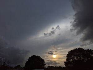 a dark and cloudy  sunset
